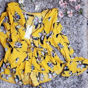 Ruffle tie front peplum blouse